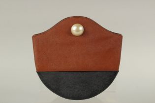 A RENAUD PELLEGRINO, PARIS, BLACK AND BROWN BAG with mother-of-pearl stud. 21cms long x 20cms deep.
