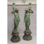 A GOOD LARGE PAIR OF BRONZE STANDING LIGHT FOUNTAINS, modelled as classical maidens, each holding