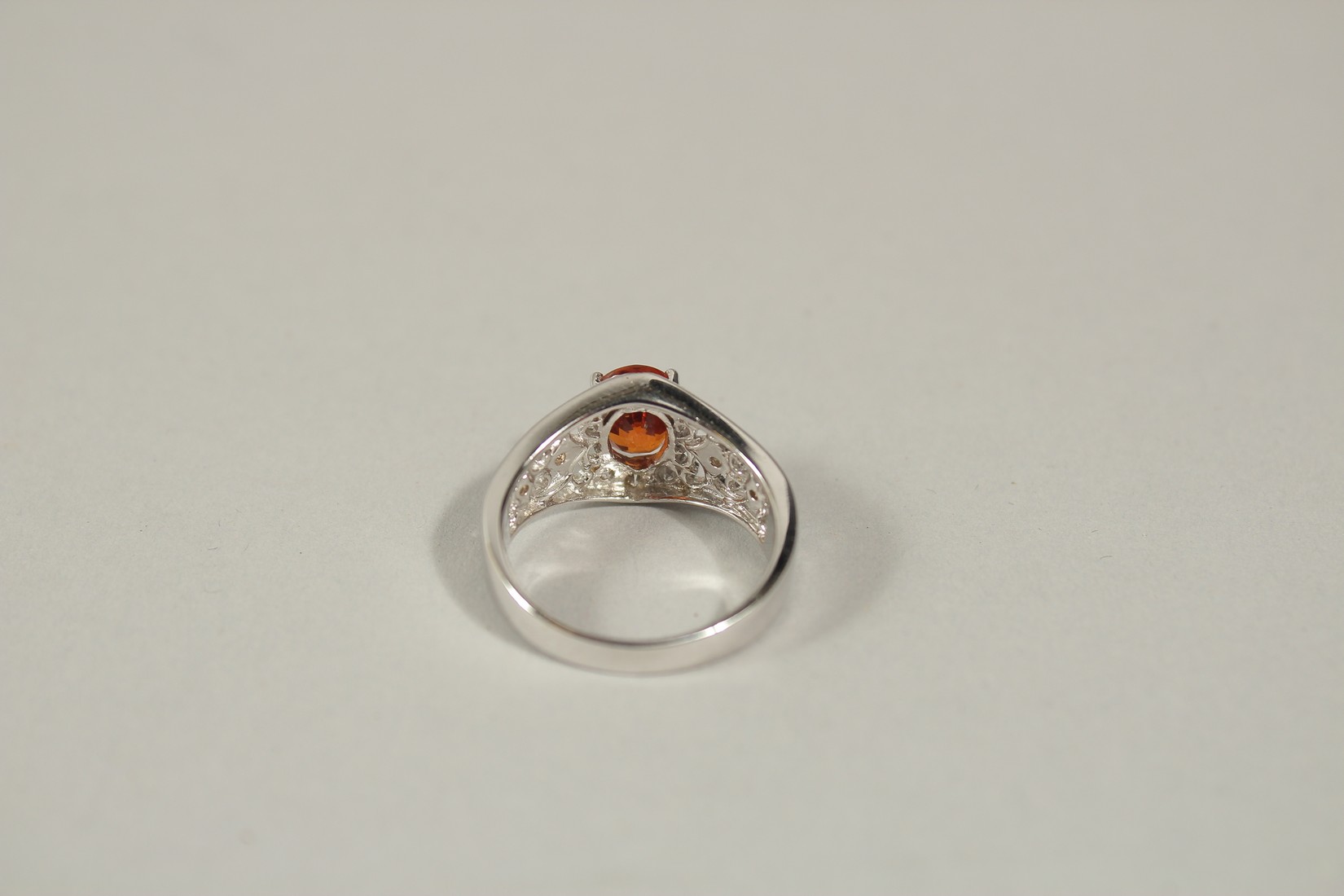 AN 18CT WHITE GOLD, DIAMOND AND ORANGE SAPPHIRE RING, size N. - Image 2 of 2