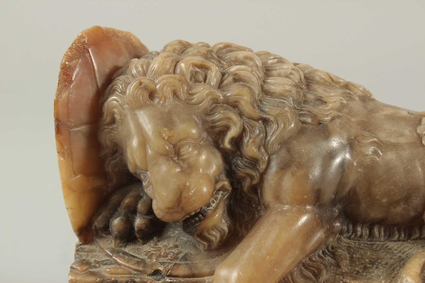 THE LION OF LUCERNE. A SOAPSTONE CARVING OF A LION on a marble base. See label on reverse. 9ins - Image 2 of 7