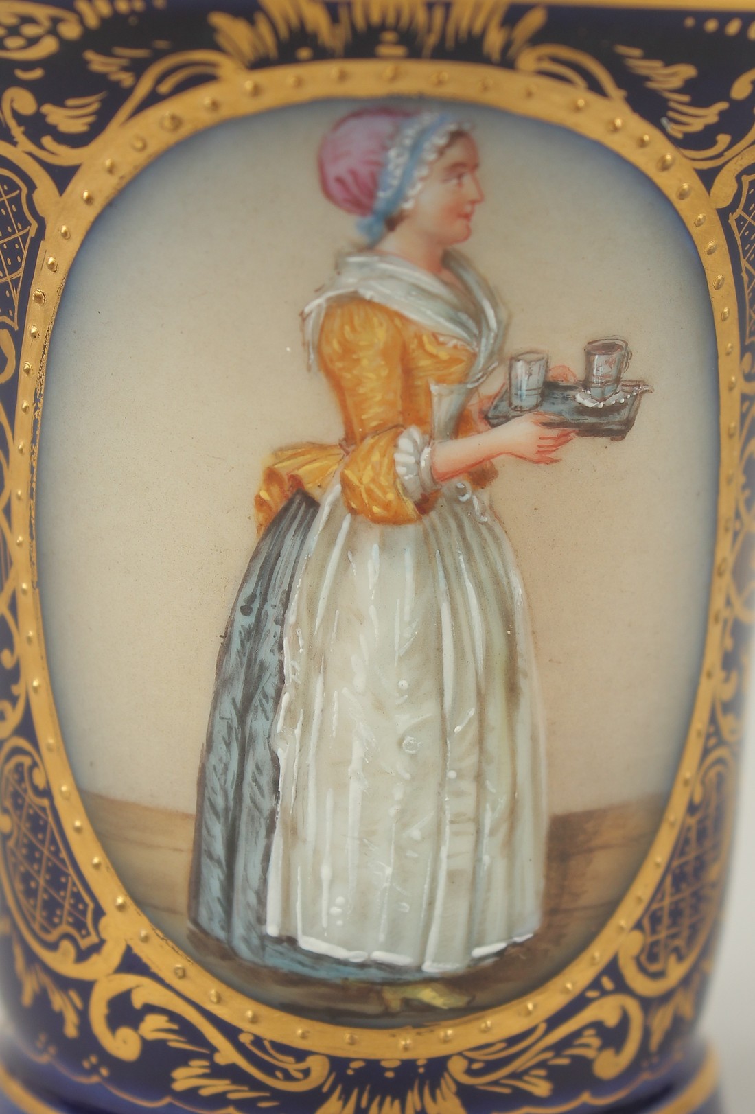 A GOOD DRESDEN CUP AND SAUCER with blue ground, painted with an oval of a lady carrying a tray. - Image 6 of 9