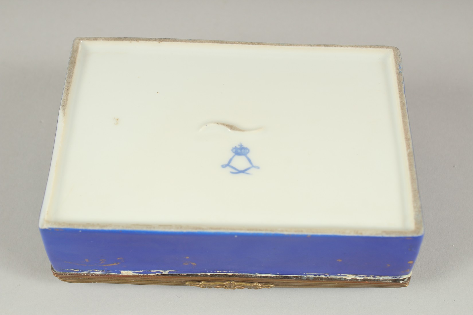 A SEVRES PORCELAIN BOX AND COVER with blue ground, with a panel of flowers. 5ins long. - Image 6 of 6
