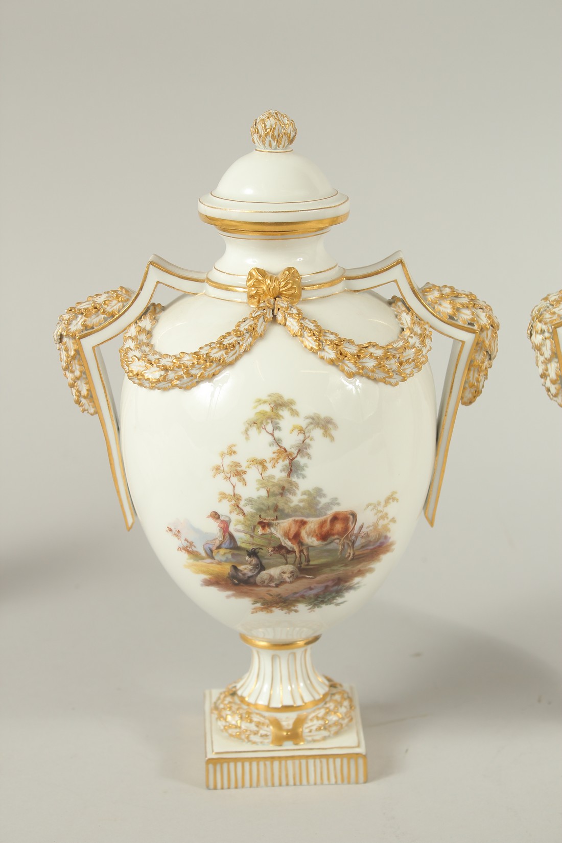 A PAIR OF MEISSEN LIDDED VASES painted with figures in pastoral landscapes. The body of the vases - Image 2 of 8