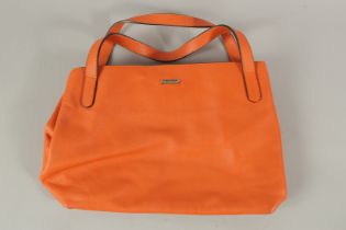 MAX MARA, AN ORANGE LEATHER BAG with carrying handles. 36cms long x 23cms deep.