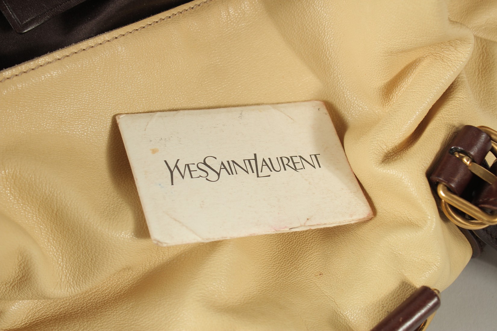 AN YVES SAINT LAURENT, PARIS, SOFT LEATHER BAG with metal clips and leather handles. 40cms long. - Image 6 of 6