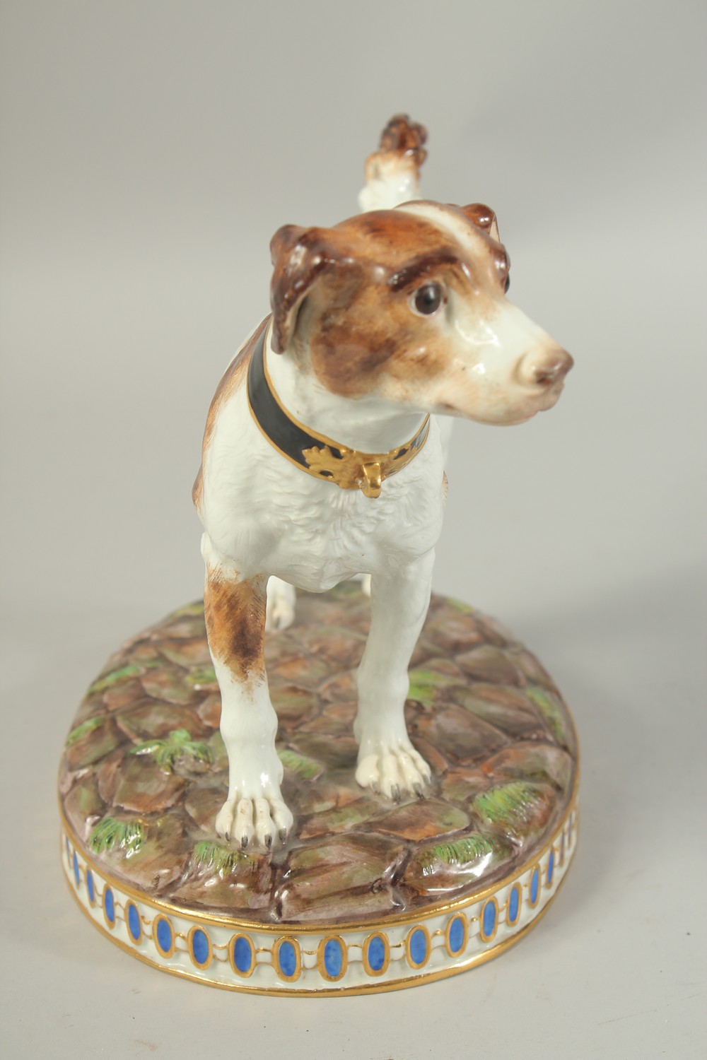 A MEISSEN MODEL OF A HUNTING DOG first modelled by Gottlob Luck. Circa. 1840. 20cm high. Cross sword - Image 3 of 7