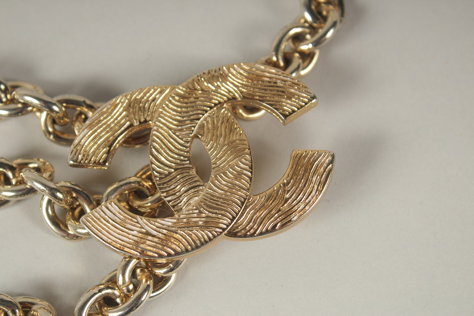 A LONG CHANEL GILT BELT with pendant and tie, double C emblem. 110cms long. - Image 3 of 9
