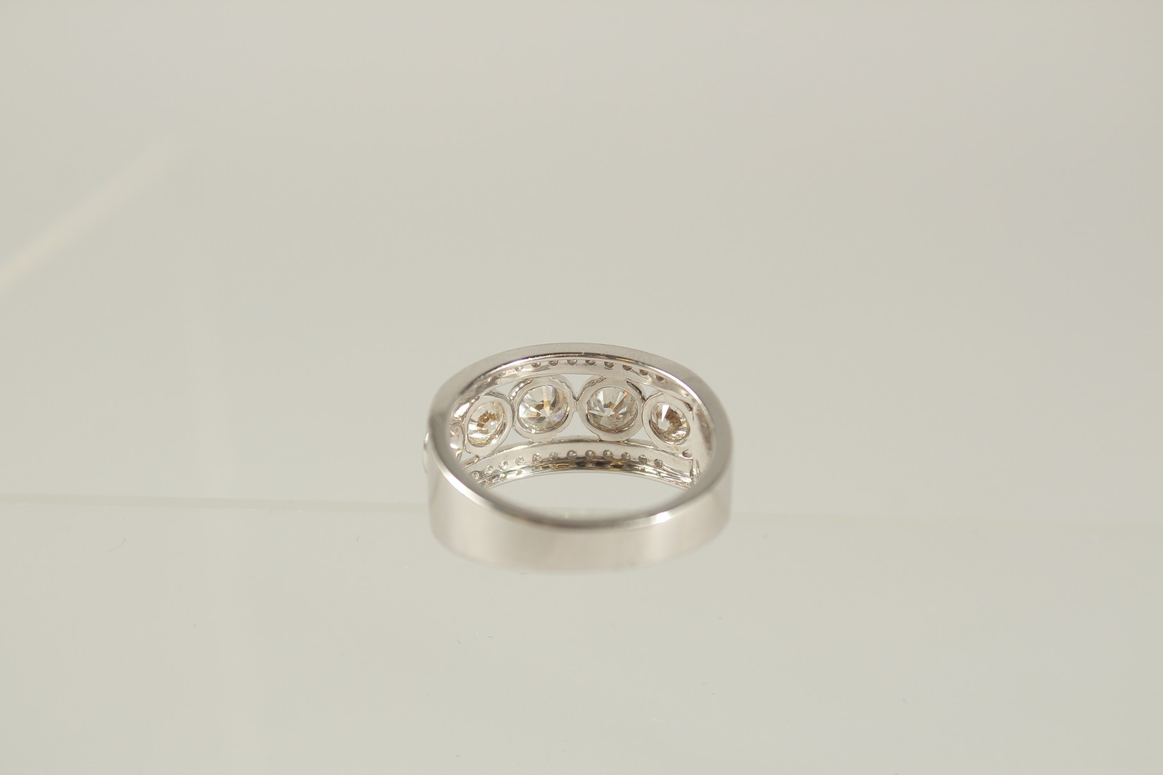 AN 18CT WHITE GOLD FIVE STONE DIAMOND RING with diamond band. - Image 2 of 3
