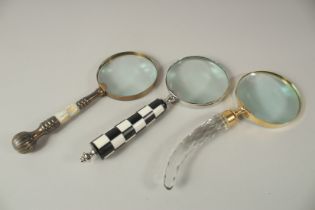 THREE VARIOUS MAGNIFYING GLASSES.