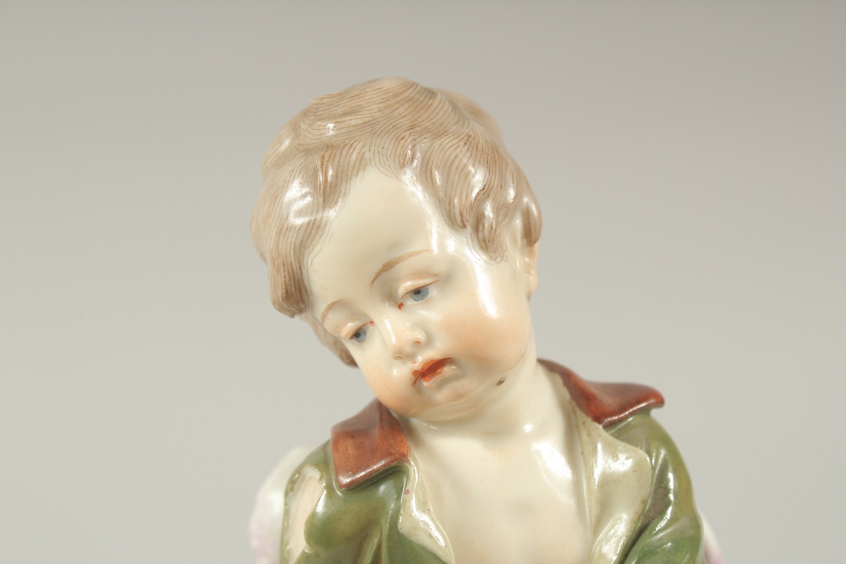 A MEISSEN PORCELAIN FIGURE "CUPID AS A BEGGAR" from the Love Series. Cross swords mark in blue. - Image 5 of 6