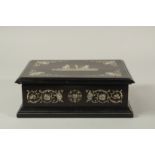 A 19TH CENTURY ITALIAN BONE INLAID BOX with classical designs. 11ins long.