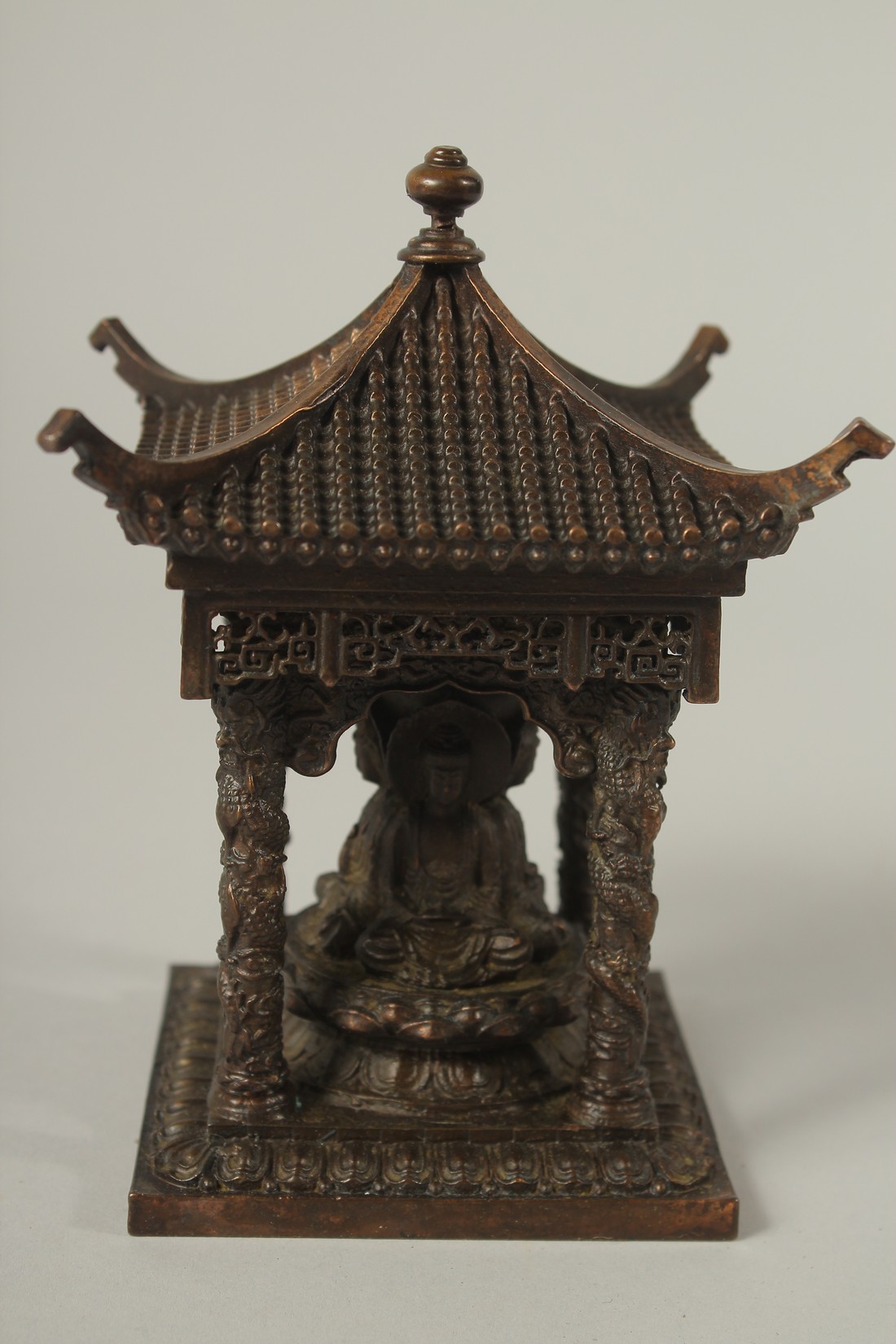 A SMALL BRONZE CHINESE TEMPLE. 14cms high. - Image 2 of 4