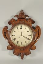A VERY GOOD CARVED WALL CLOCK BY CHARLES FRODSHAM, No. 84 Strand, LONDON. 6ins dial, in a mahogany