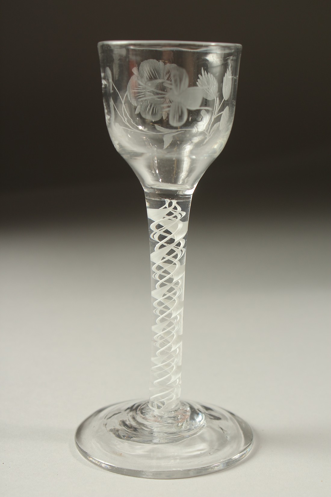 A GEORGIAN WINE GLASS, the bowl engraved with roses and opaque twist stem. 5.75ins high. - Image 3 of 5