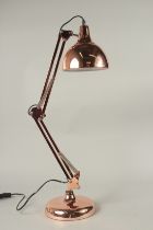 A COPPER ANGLE POISE LAMP.