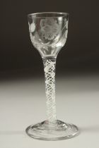 A GEORGIAN WINE GLASS, the bowl engraved with roses and opaque twist stem. 5.75ins high.