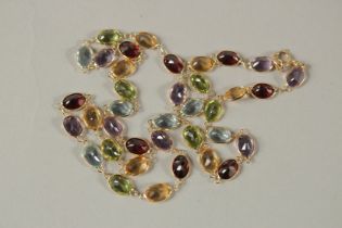 AN 18CT YELLOW GOLD MULTI-COLOUR GEM STONE NECKLACE. 18ins long.