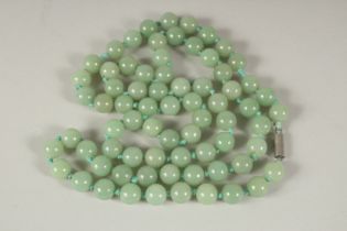 A GOOD JADE SEVENTY-TWO BEAD NECKLACE. 86cms long.