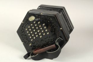A GOOD LACHENAL & CO. 55 KEY ROSEWOOD OCTAGONAL SHAPED CONCERTINA 3686. 7ins with leather thumb