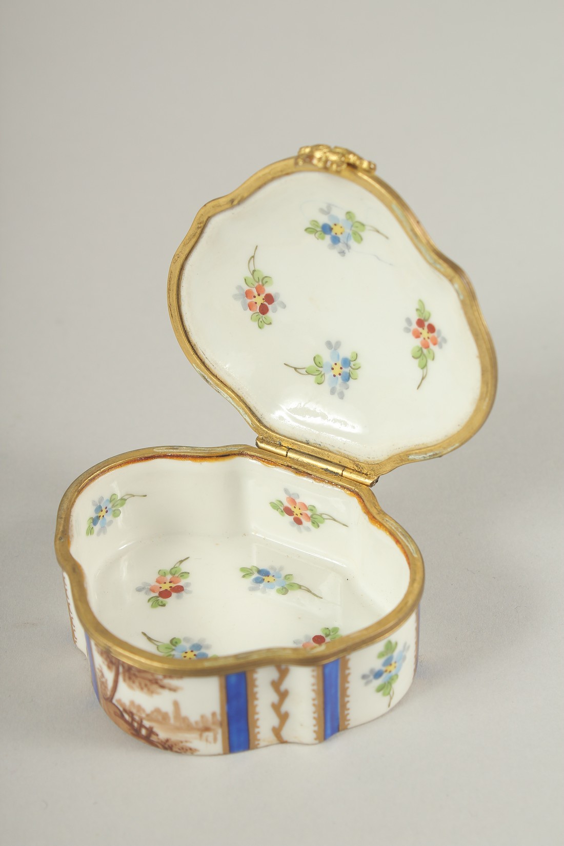 A SMALL SEVRES PORCELAIN PILL BOX AND COVER with blue and white decoration and roses. 3ins wide. - Image 2 of 3
