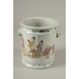 A CHINESE CIRCULAR PORCELAIN BRUSH POT painted with figures. 16cms high.