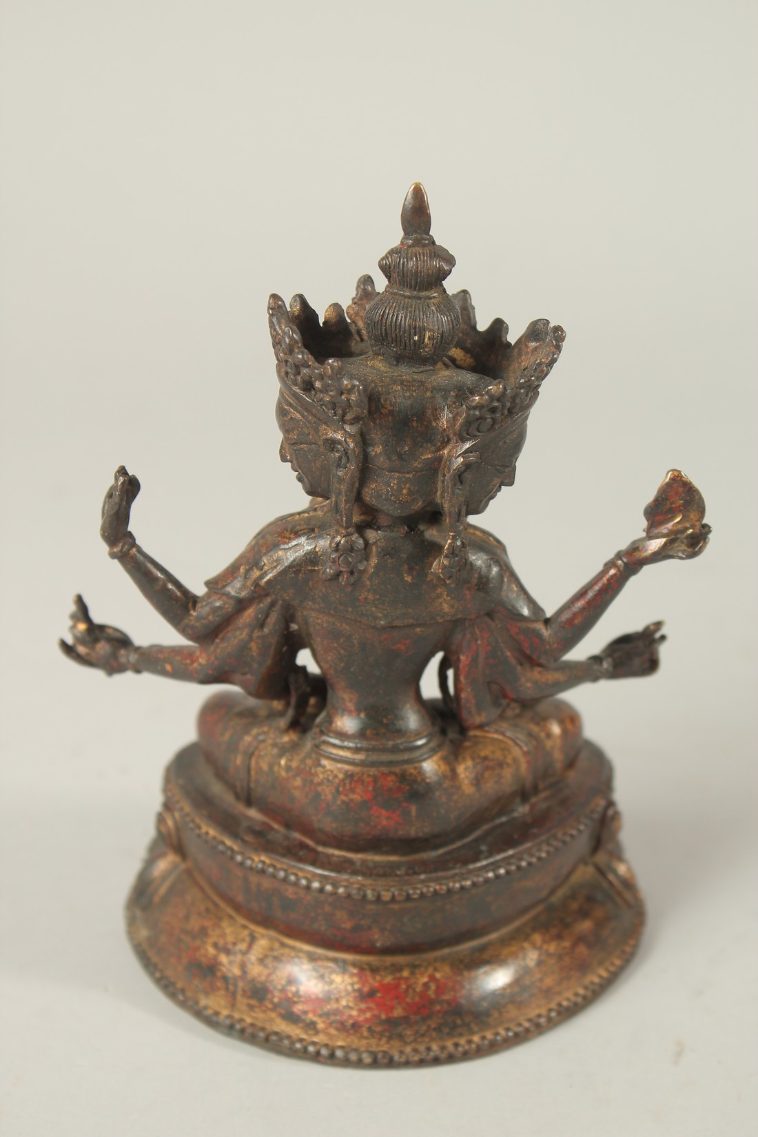 A BRONZE FIGURE OF A MULTI-ARMED DEITY. 17cms high. - Image 2 of 3