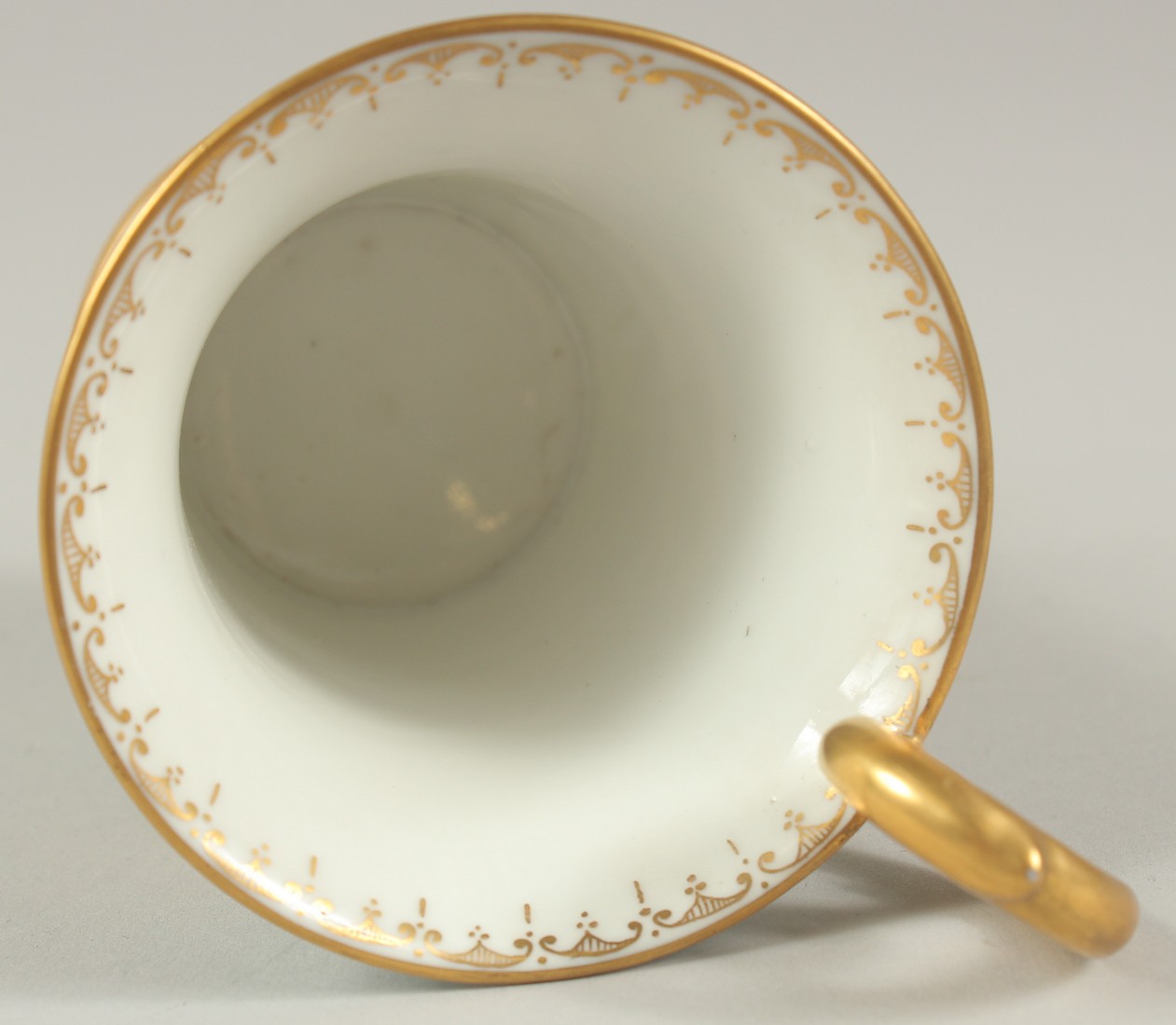 A GOOD DRESDEN CUP AND SAUCER with blue ground, painted with an oval of a two cupids playing - Image 7 of 8