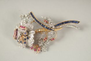 A SUPERB 18CT GOLD, DIAMOND, RUBY AND SAPPHIRE TREMBLING FLOWER BROOCH. 35grams.