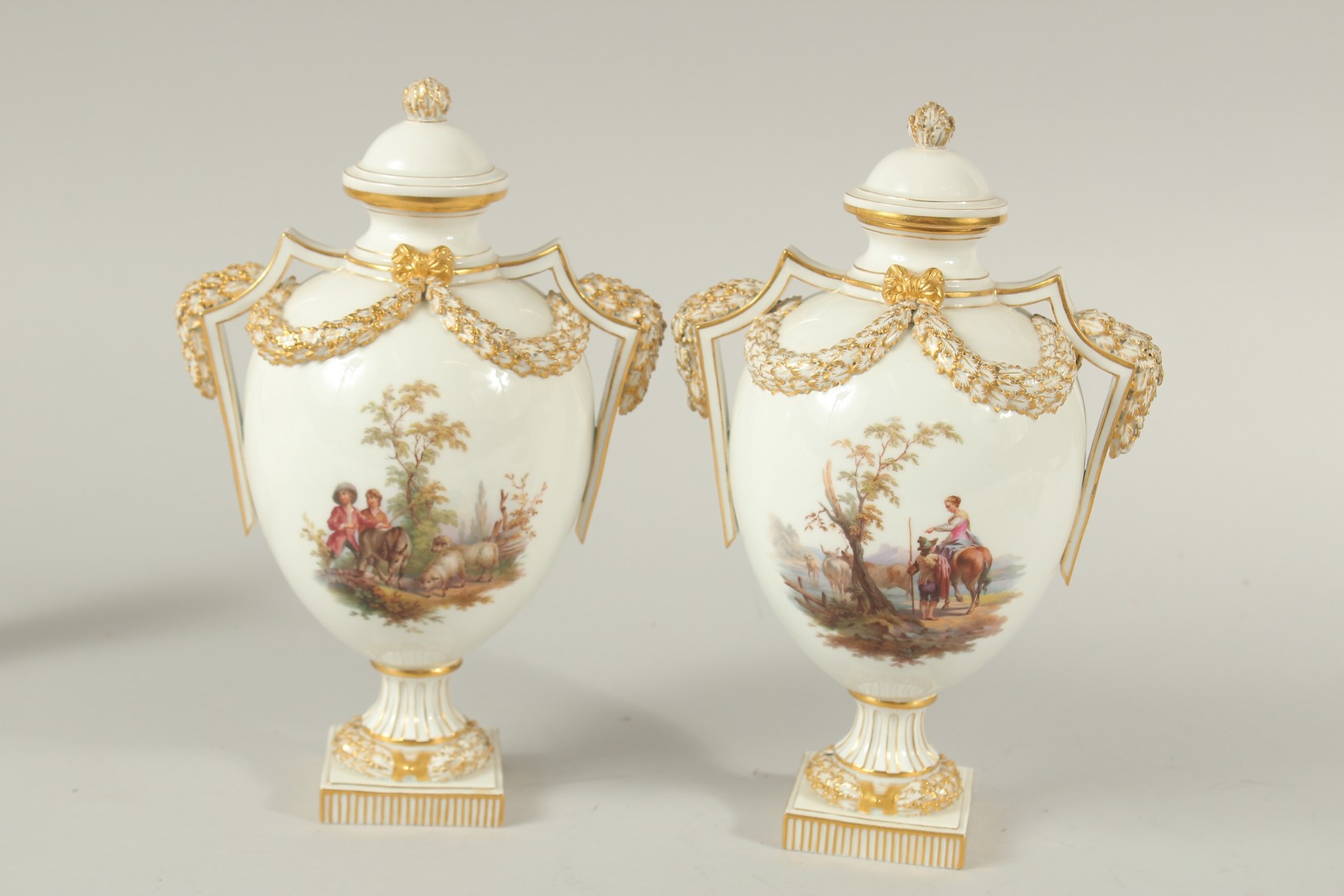 A PAIR OF MEISSEN LIDDED VASES painted with figures in pastoral landscapes. The body of the vases - Image 5 of 8