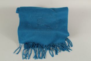 A BURBERRY BLUE WOOL SCARF. 200cms long.