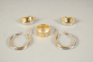 A CARTIER 18CT GOLD RING AND TWO PAIRS OF EARRINGS, in a red pouch.