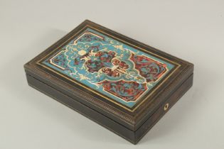 A 19TH CENTURY FRENCH BOULLE INLAID ARTIST'S BOX with fitted interior and key. 12ins long.