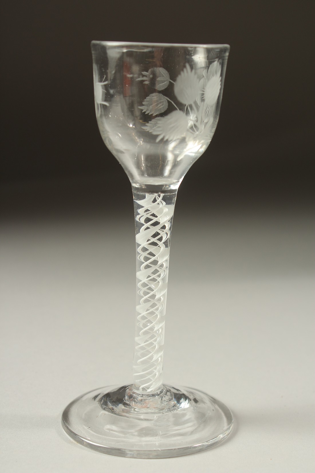 A GEORGIAN WINE GLASS, the bowl engraved with roses and opaque twist stem. 5.75ins high. - Image 2 of 5