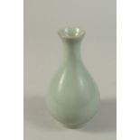 A CHINESE CELADON GLAZED RU WARE VASE. 13.5cms high.