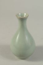 A CHINESE CELADON GLAZED RU WARE VASE. 13.5cms high.