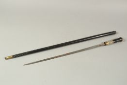 AN INDIAN SWORD STICK with bone handle.