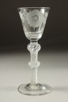 A SUPERB JACOBITE WINE GLASS, the bowl engraved with roses "FIAT", with air twist stem and double