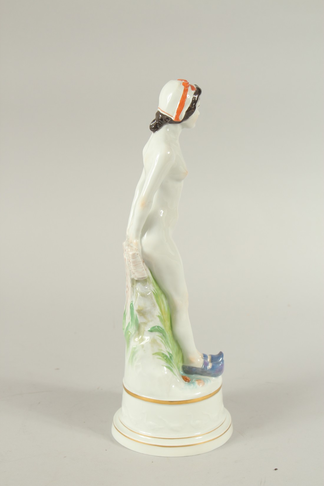 A MEISSEN FIGURE OF A STANDING WOMAN RESTING ON A FENCE. A circle of geese around the base. Modelled - Image 2 of 6