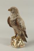 A SUPERB SILVER EAGLE on a rocky base. .925 SILVER. 9ins high.
