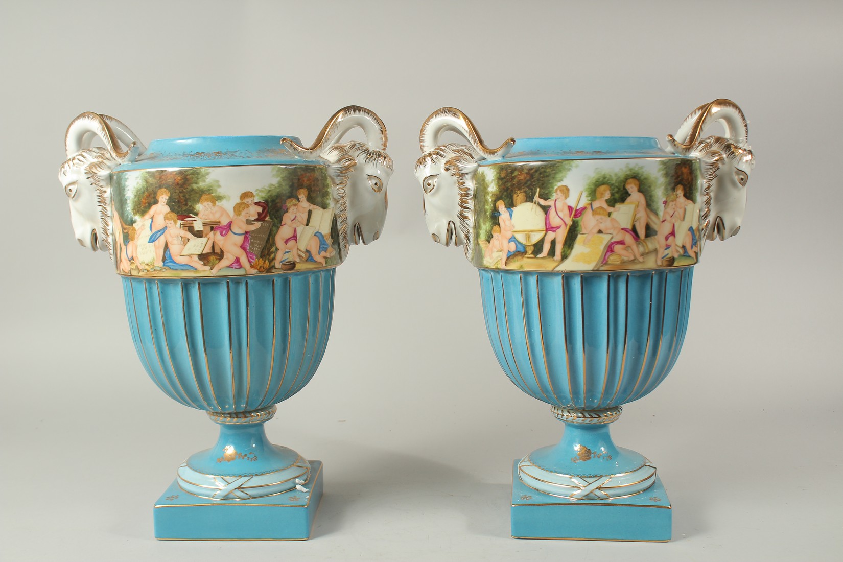A LARGE PAIR OF SEVRES DESIGN CIRCULAR RAM'S HEAD BLUE VASES. 40cms high. - Image 3 of 3