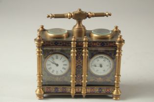 A DOUBLE GILT AND CLOISONNE ENAMEL CLOCK with carrying handles.