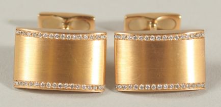 A PAIR 18CT ROSE GOLD AND DIAMOND CUFFLINKS, boxed. 15.3grams.