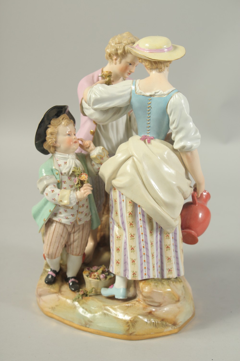 A LARGE MEISSEN GROUP OF GARDENERS with a child at the back, first modelled by Victor Acier, Cross - Image 4 of 8