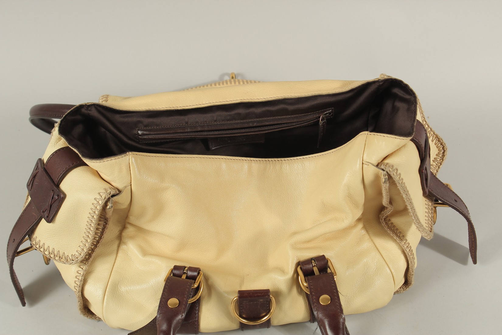 AN YVES SAINT LAURENT, PARIS, SOFT LEATHER BAG with metal clips and leather handles. 40cms long. - Image 3 of 6