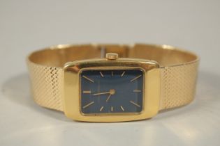 A GENTLEMAN'S 18CT GOLD WRISTWATCH by GIRARD-PERREGAUX with dark blue. Stamped 18k. No. 9113 FA.