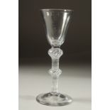 A GEORGIAN WINE GLASS with double knop air twist stem. 6ins high.