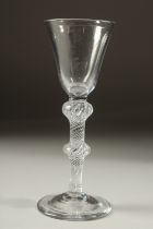 A GEORGIAN WINE GLASS with double knop air twist stem. 6ins high.