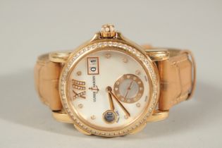 A SUPERB ULYSSE NARDIN 18CT ROSE GOLD WRISTWATCH with mother-of-pearl face, diamond surround, date