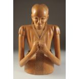 A LARGE AFRICAN CARVED WOOD FIGURE, 42cm high.