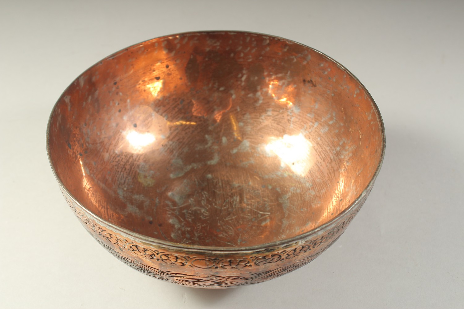 A 19TH CENTURY QAJAR ENGRAVED TINNED COPPER BOWL, 19.5cm diameter. - Image 4 of 5